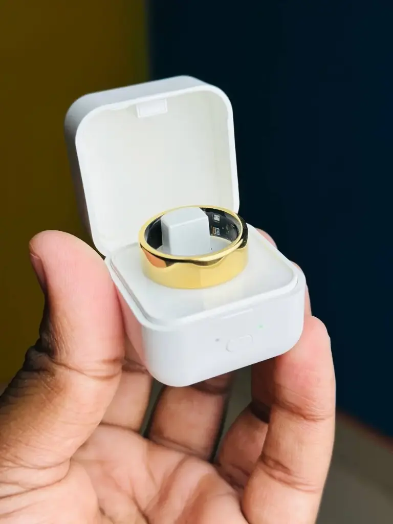 Smart Fitness Ring – Golden, size 9, with a charging case for all-day tracking.